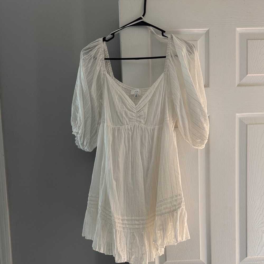 White dress with puff sleeves